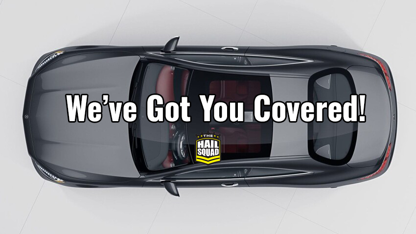 Top view of a sleek black car parked in front of a cozy home with text overlay: "We've Got You Covered!" and a small logo saying "The Hail Squad.